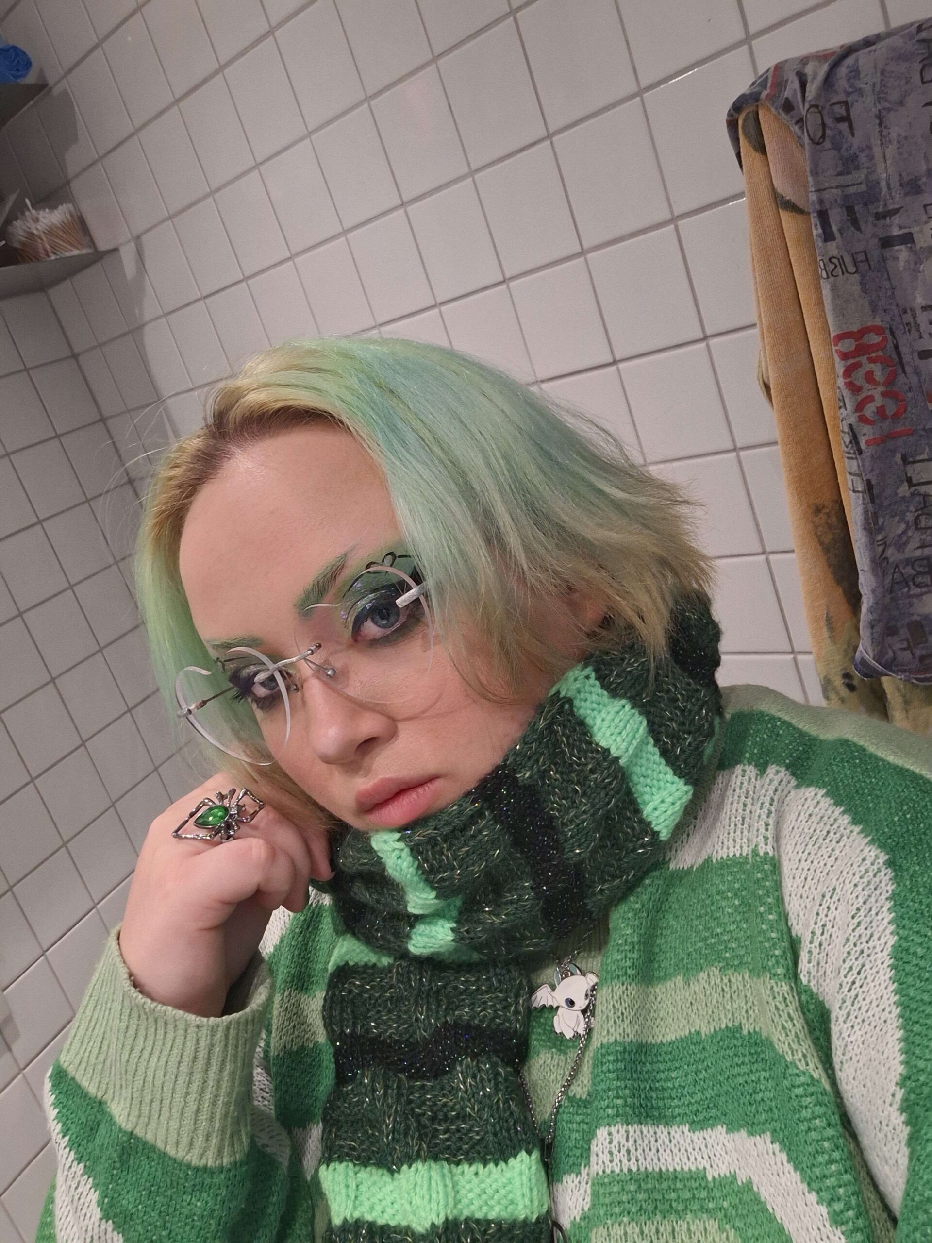 Xenon with faded green hair