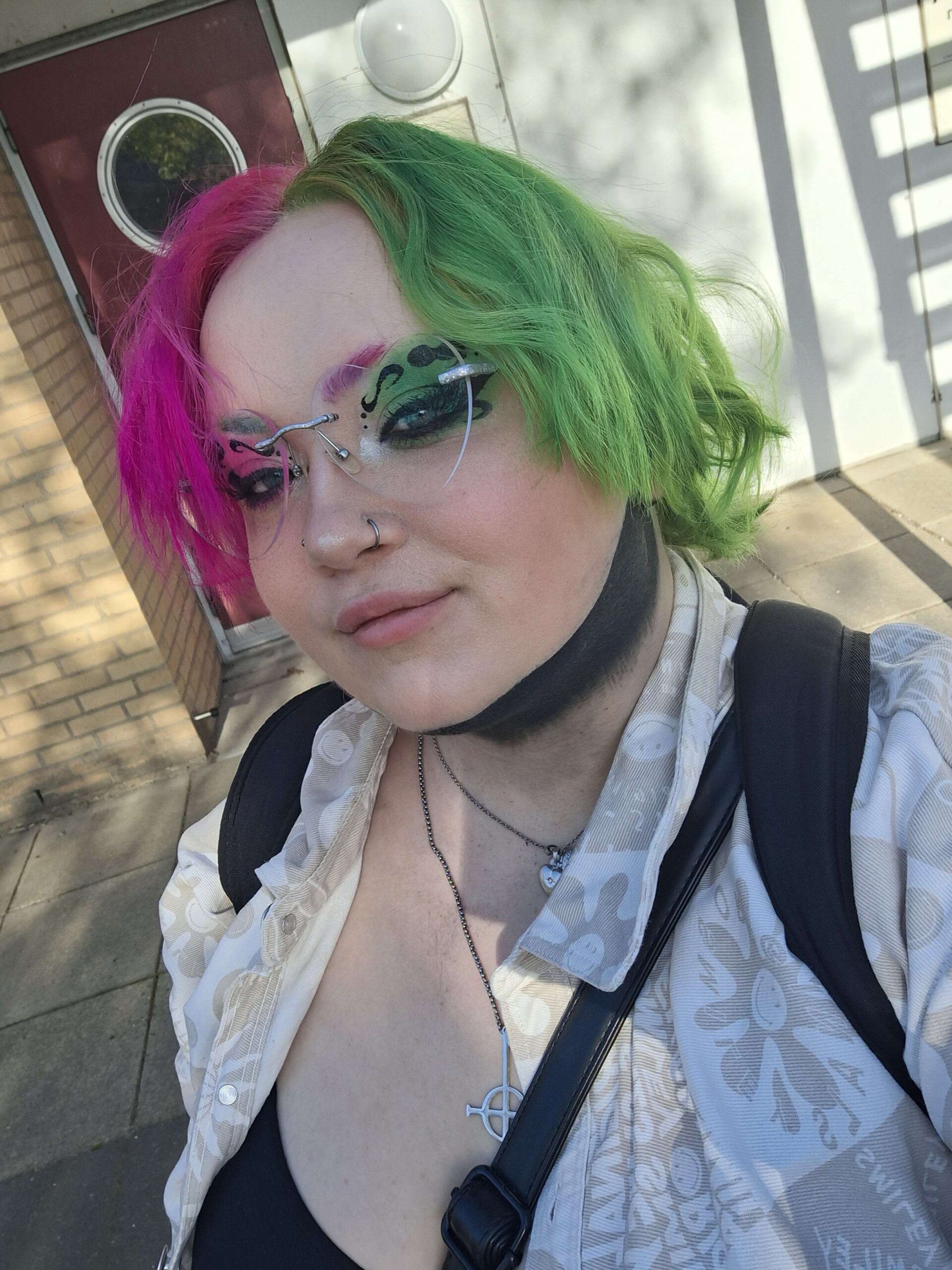 Xenon with green and pink hair